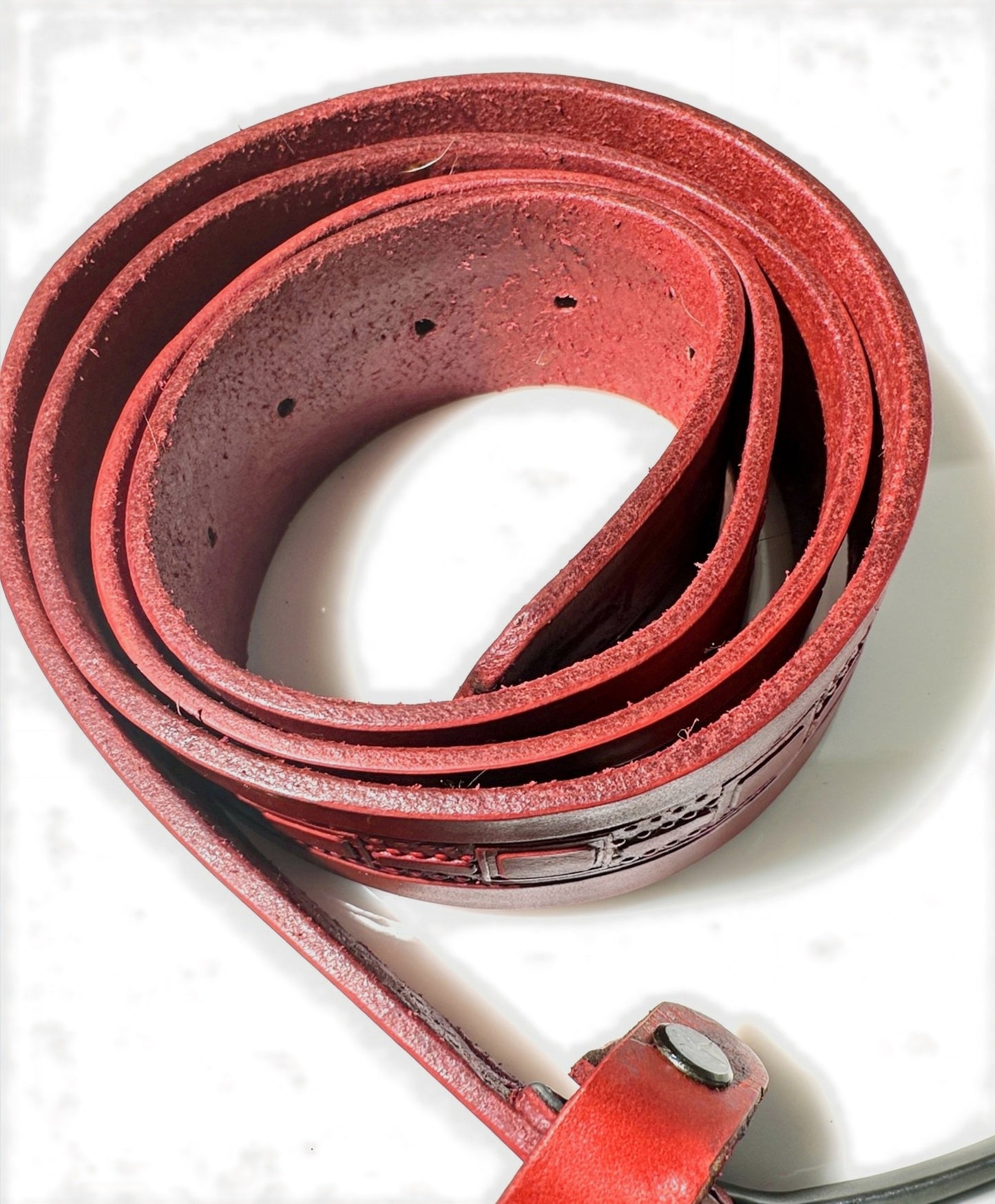 Embossed red leather belt