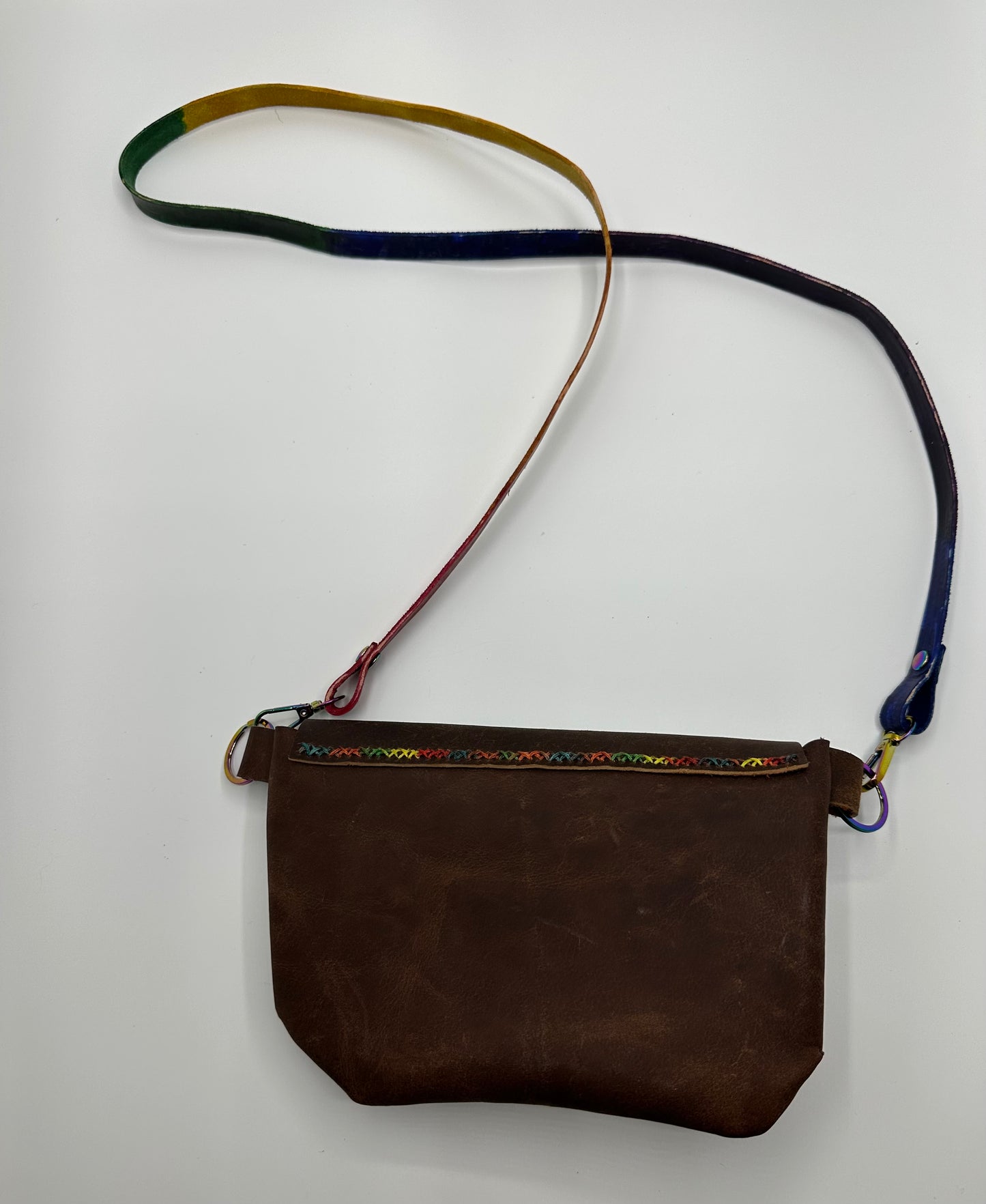 Full grain brown leather purse with rainbow accents