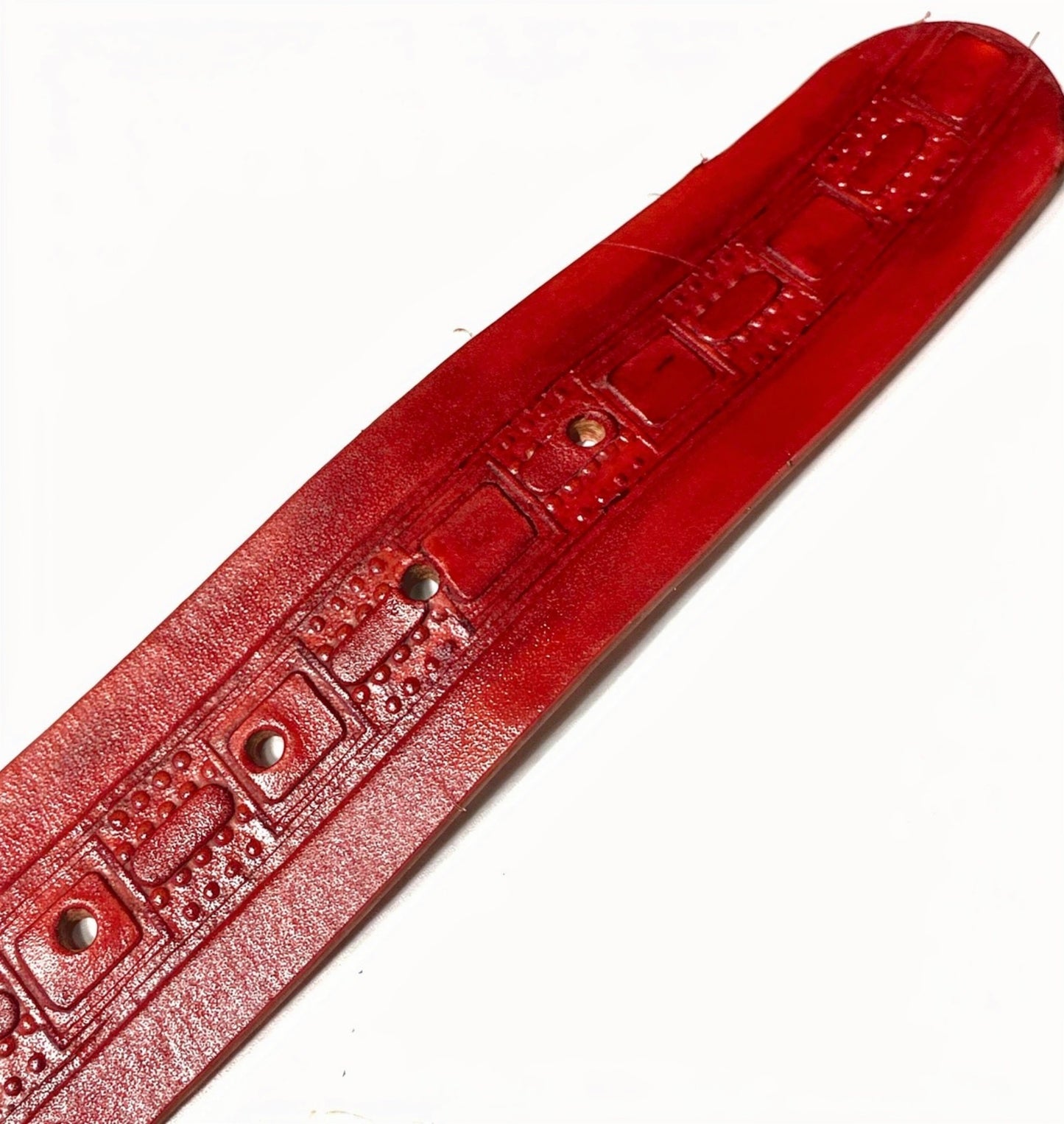 Embossed red leather belt