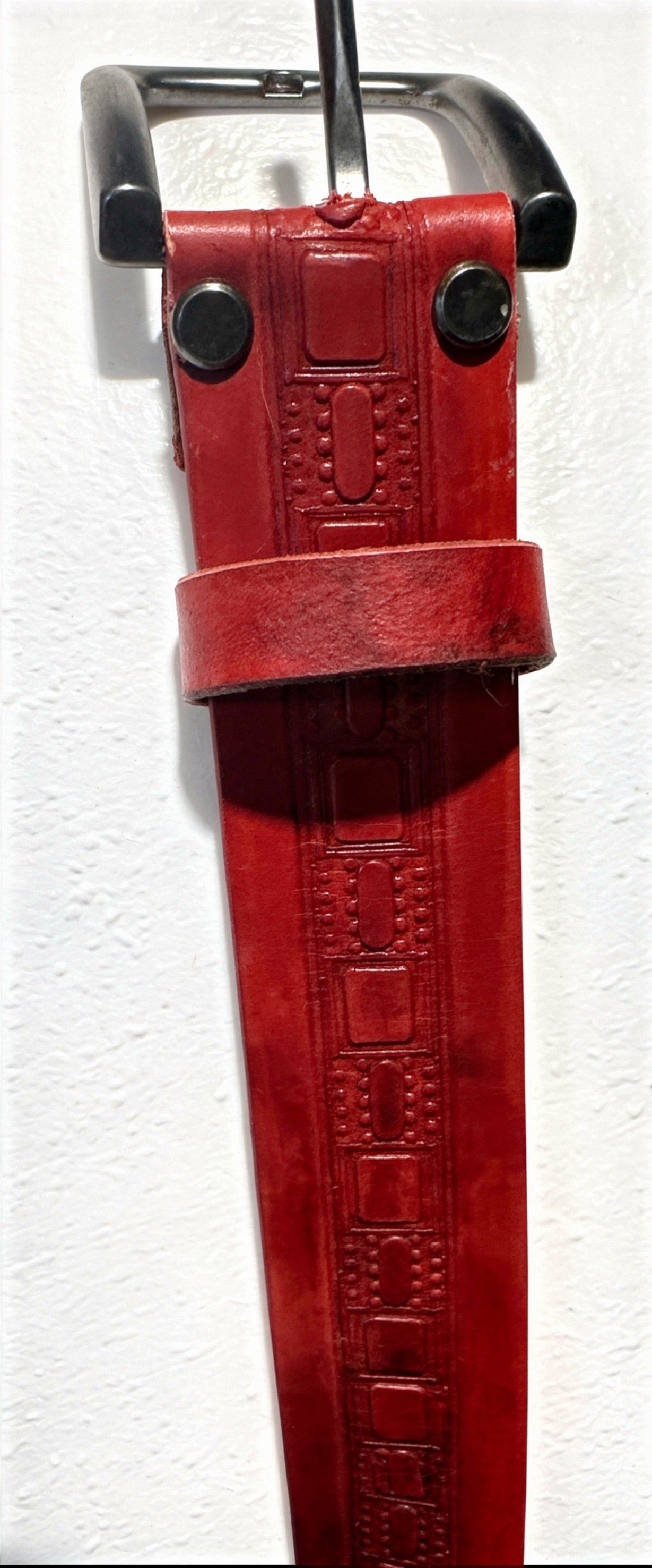 Embossed red leather belt