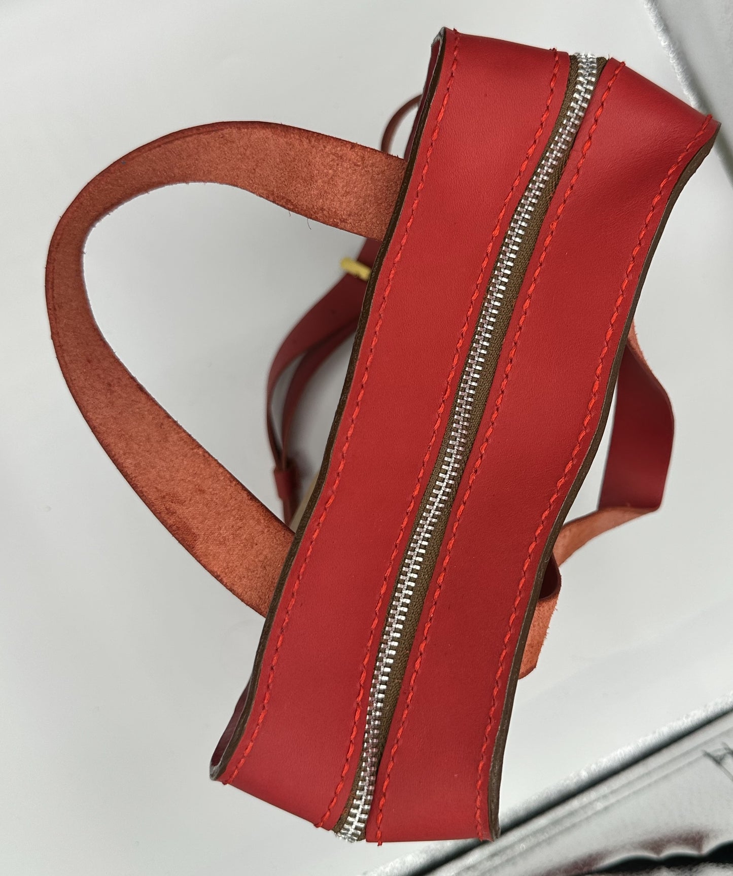 1000 line red and brown top grain leather bag