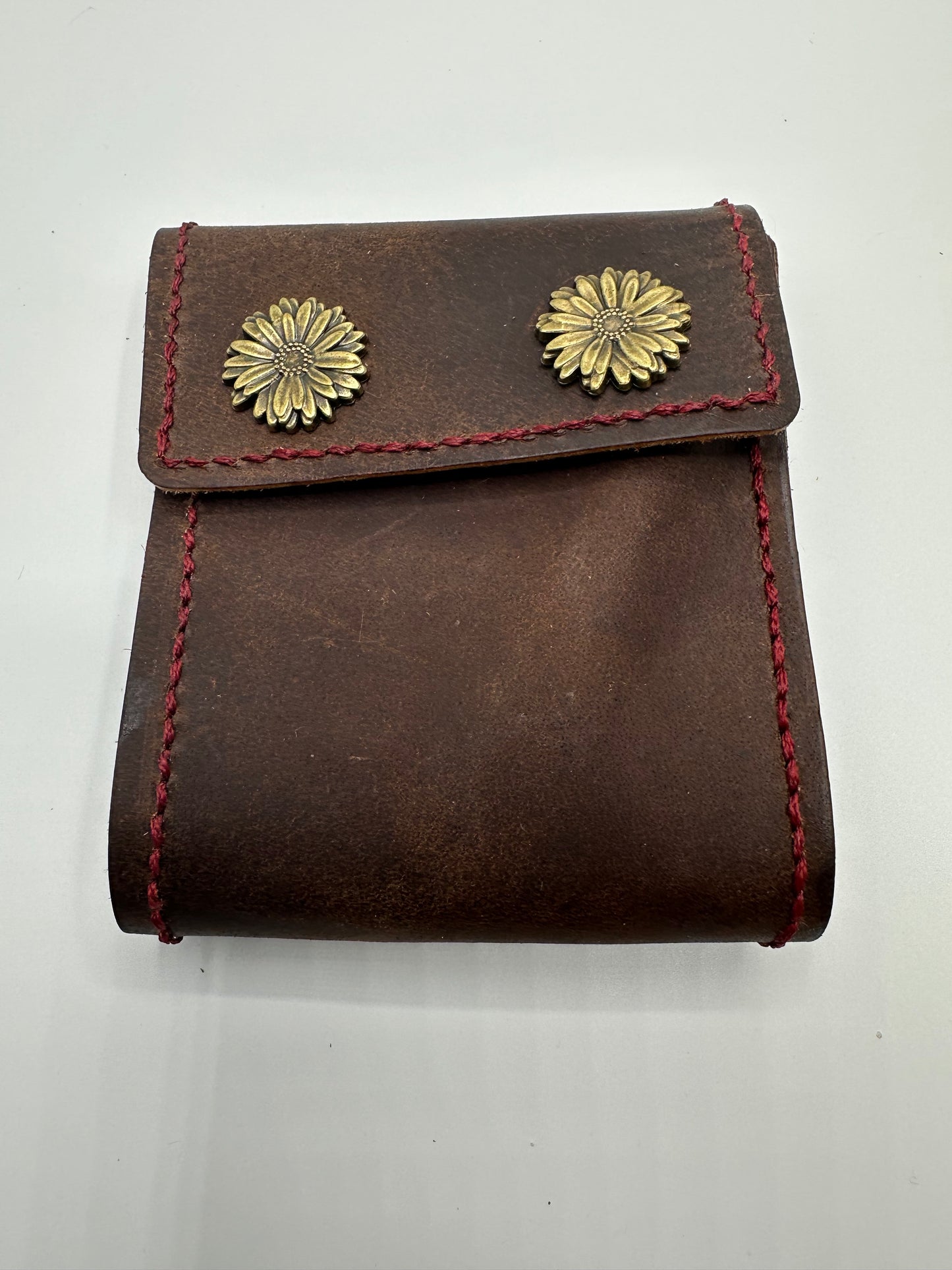 Handmade leather wallet with flower hardware