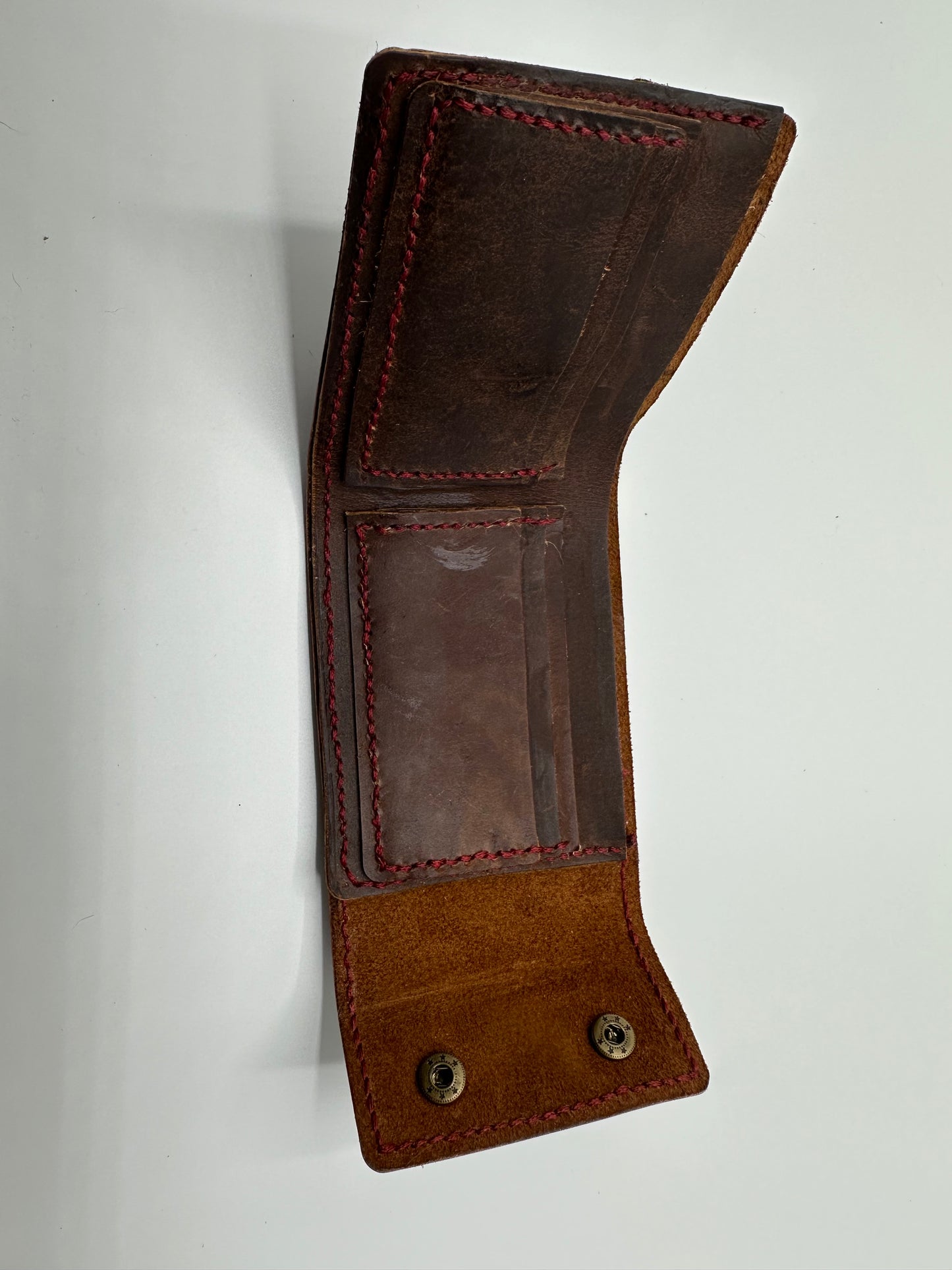Handmade leather wallet with flower hardware