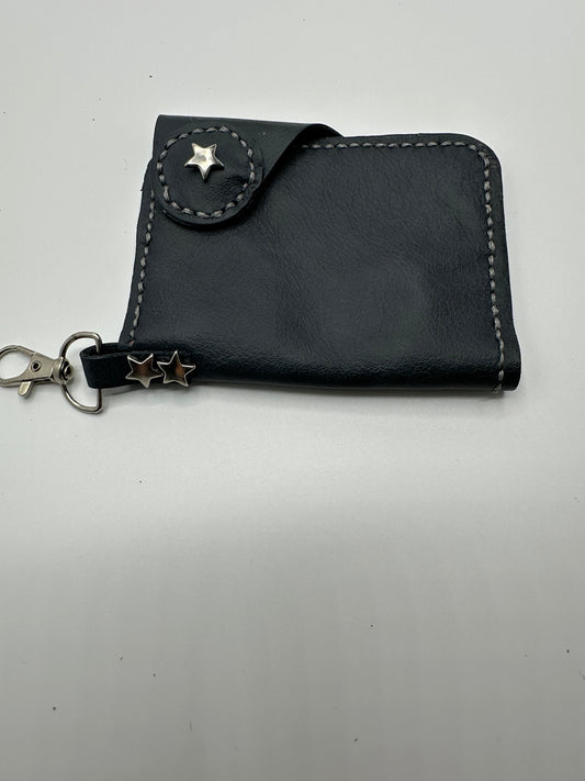 Blue leather wallet with clip and star accents