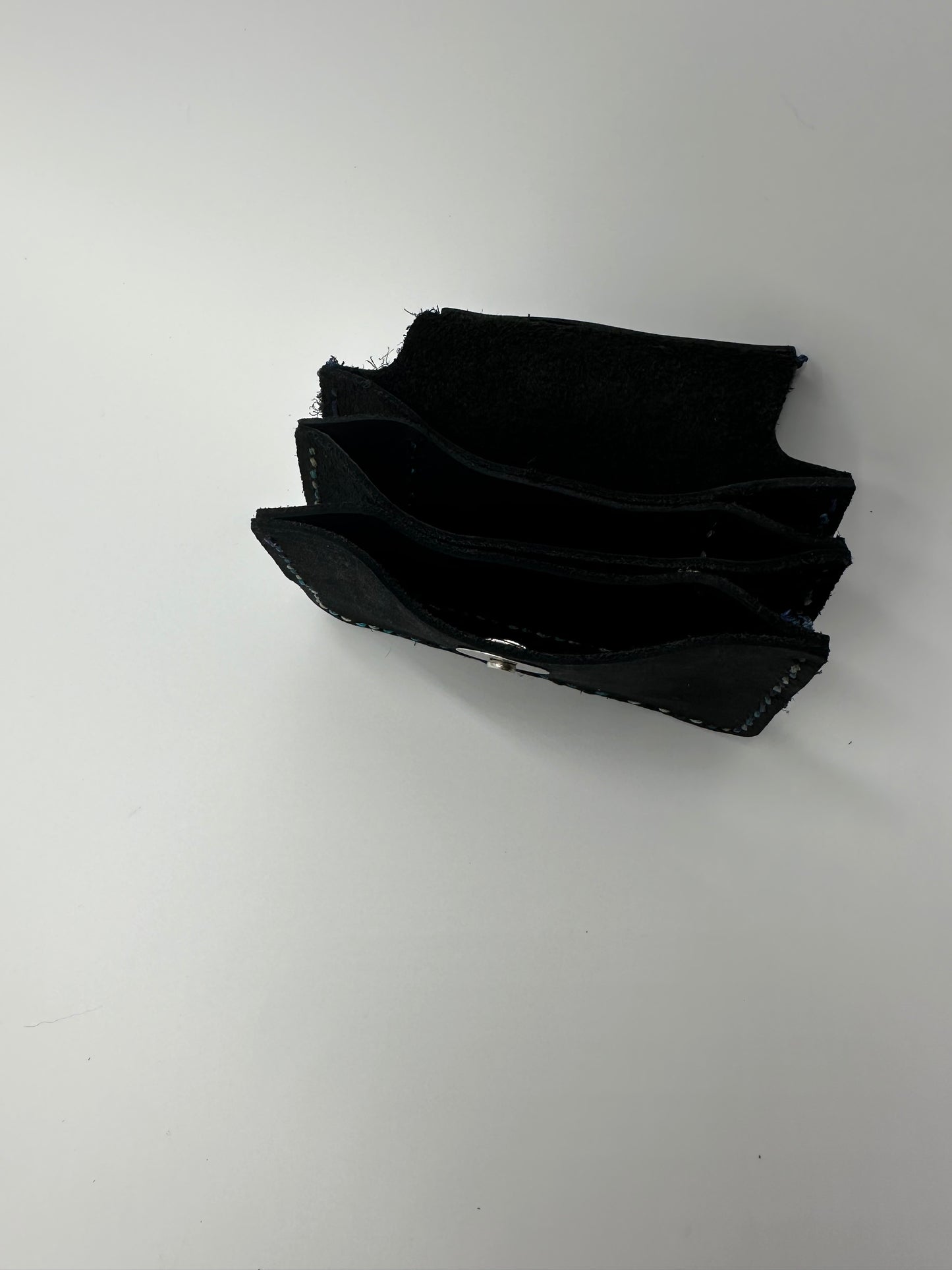Black matte leather triquerta wallet